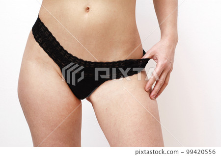 Black lace panties on a sexy woman 99420556