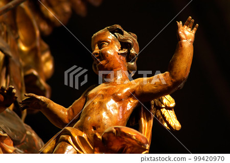 Wooden statue in a catholic church Wooden statue in a catholic church 99420970