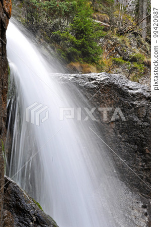 Beautiful waterfall in the forest Beautiful waterfall in the forest 99420987