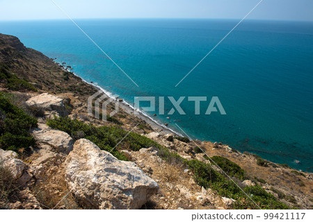 Sea and coastline view from a rocky height 99421117