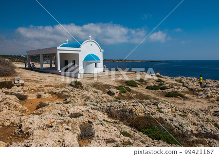 Tourists and pilgrims visiting the Agioi Anargyroi chapel situated in Cape Greco, Cyprus island 99421167