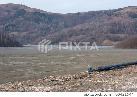 Decanting lake pipe installation treatment with lime and gypsum for purification of water of heavy metals 99421544
