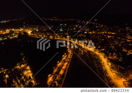 Aerial view of Cluj Napoca city by night. Urban landscape Aerial view of Cluj Napoca city by night. Urban landscape 99421554