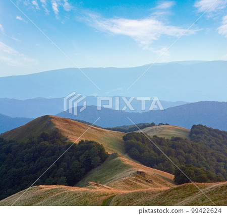 Autumn sunrise mountain view with haze (Carpathian, Ukraine) 99422624