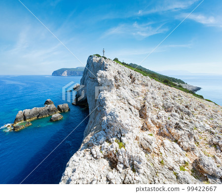 Rocky south cape of Lefkas island and lighthouse (Greece, Ionian Sea) Rocky south cape of Lefkas island and lighthouse (Greece, Ionian Sea) 99422667