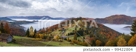 Foggy early morning autumn mountains scene. Peaceful picturesque traveling, seasonal, nature and countryside beauty concept scene. Carpathian Mountains, Ukraine. Foggy early morning autumn mountains scene. Peaceful picturesque traveling, seasonal, nature and countryside beauty concept scene. Carpathian Mountains, Ukraine. 99422804