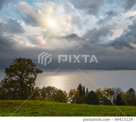 Autumn alpine lake Mondsee shore view from Raststation Mondsee terraces, Austria Autumn alpine lake Mondsee shore view from Raststation Mondsee terraces, Austria 99423129