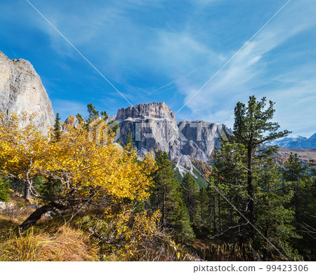 Autumn alpine Dolomites rocky mountain scene, Sudtirol, Italy. Peaceful view near Sella Pass. Autumn alpine Dolomites rocky mountain scene, Sudtirol, Italy. Peaceful view near Sella Pass. 99423306