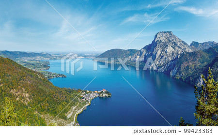 Peaceful autumn Alps mountain Traunsee lake view from Kleiner Sonnstein rock summit, Ebensee, Upper Austria. 99423383