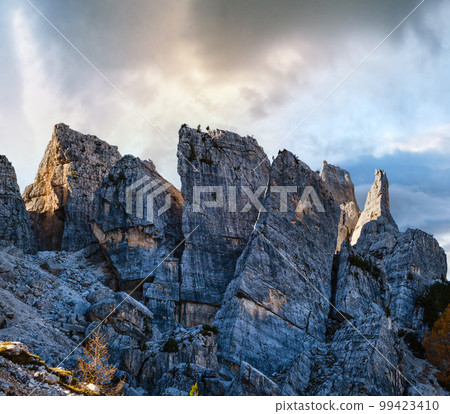 Autumn Dolomites mountain scene, Sudtirol, Italy. Cinque Torri (Five towers) rock formation. 99423410