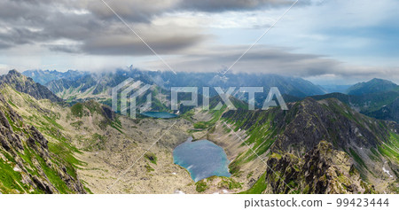 Tatra Mountain view to group of glacial lakes from path Kasprowy Wierch to Swinica mount, Poland. Tatra Mountain view to group of glacial lakes from path Kasprowy Wierch to Swinica mount, Poland. 99423444