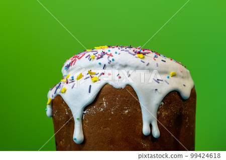 Easter holiday sweet paska bread isolated on green Easter holiday sweet paska bread isolated on green 99424618