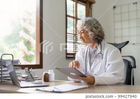 Professional doctor working at clinic. Digital healthcare and network connection, Data analysis 99427940