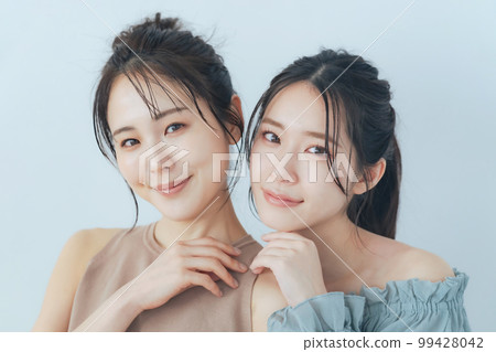 Two women's beauty image skin care beauty salon 99428042