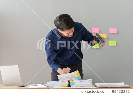 Tired business people in stress works with many paperwork document. migraine attack. Freelance, work from home. 99428251