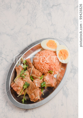 Ketchup rice and chicken wings lunch 99428826