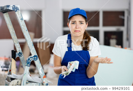 Disappointed female repairer with cash Disappointed female repairer with cash 99429101