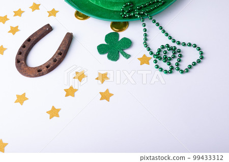 Top view photo of st patrick's day decorations with copy space on white background 99433312
