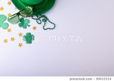 Top view photo of st patrick's day decorations with copy space on white background 99433314