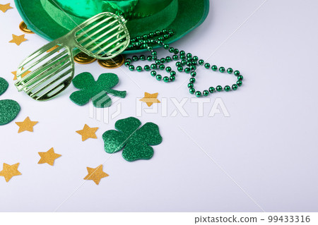 Top view photo of st patrick's day decorations with copy space on white background 99433316