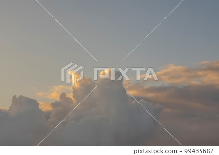 dramatic clouds in the early morning sky 99435682