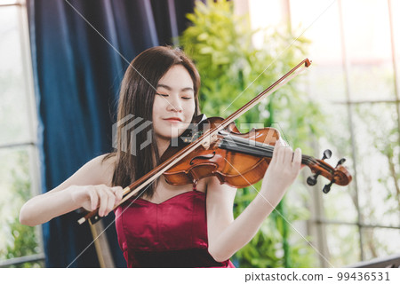 Violinist woman Violinist woman 99436531