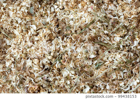 Dried meadowsweet herb background, top view, Filipendula ulmaria, macro texture. 99438153
