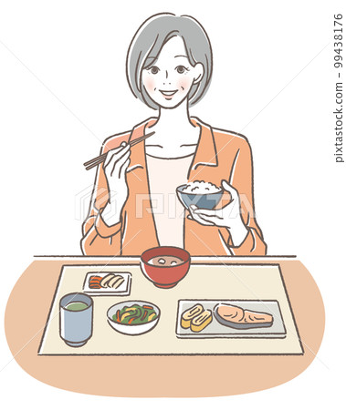 Senior woman eating with a smile Senior woman eating with a smile 99438176