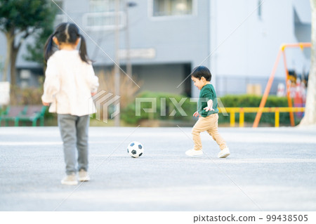 Sisters playing in the park 99438505