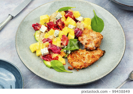 Meat salad with citrus fruits, mango, cheese and quinoa 99438849