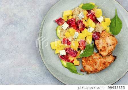 Meat salad with citrus fruits, mango, cheese and quinoa 99438853