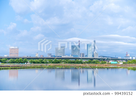 ``Saitama Prefecture'' Minuma Rice Fields Saitama Shintoshin reflected in rice fields during rice planting season 99439152