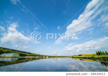 ``Saitama Prefecture'' Minuma Rice Fields Saitama Shintoshin reflected in rice fields during rice planting season ``Saitama Prefecture'' Minuma Rice Fields Saitama Shintoshin reflected in rice fields during rice planting season 99439413