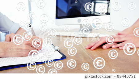 Image of euro symbols over caucasian business people in office 99440751