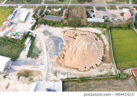 Pile of sand, gravel and concrete plant in aerial view. Pile of sand, gravel and concrete plant in aerial view. 99441423