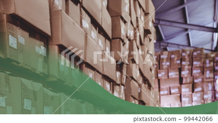 Green technology background over stack of cardboard boxes in the warehouse Green technology background over stack of cardboard boxes in the warehouse 99442066