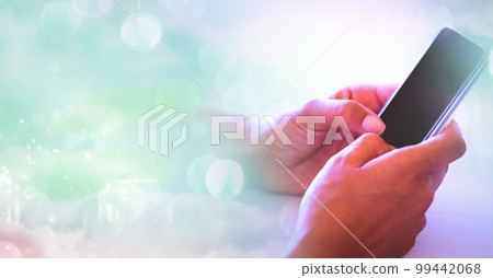 Composition of light circles over caucasian woman using smartphone Composition of light circles over caucasian woman using smartphone 99442068