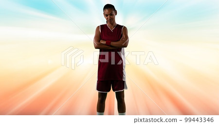 Composition of female basketball player with arms crossed with copy space Composition of female basketball player with arms crossed with copy space 99443346
