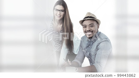 Composition of two happy diverse businesspeople in meeting room with double exposure Composition of two happy diverse businesspeople in meeting room with double exposure 99443862