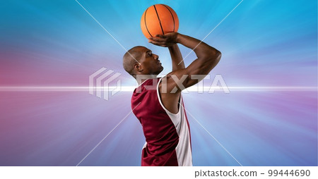 Composition of male basketball player holding basketball with copy space Composition of male basketball player holding basketball with copy space 99444690