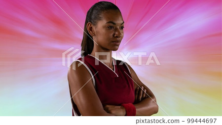 Composition of female basketball player with arms crossed with copy space 99444697