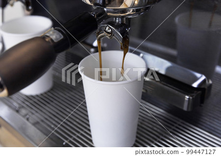 barista brewing, preparing coffee in cafe barista brewing, preparing coffee in cafe 99447127