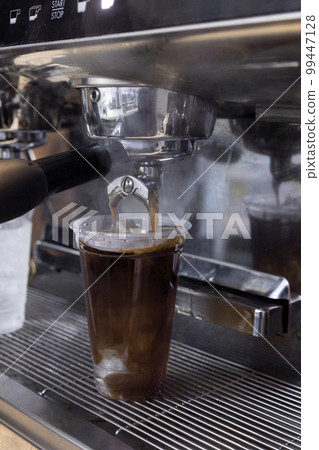 barista brewing, preparing coffee in cafe barista brewing, preparing coffee in cafe 99447128