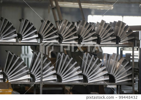 Metal blanks in the shop of a metallurgical plant. Metal blanks in the shop of a metallurgical plant. 99448432