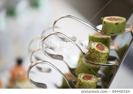 Buffet Snack Food.Snack food for a buffet table. Rolls with filling 99448584