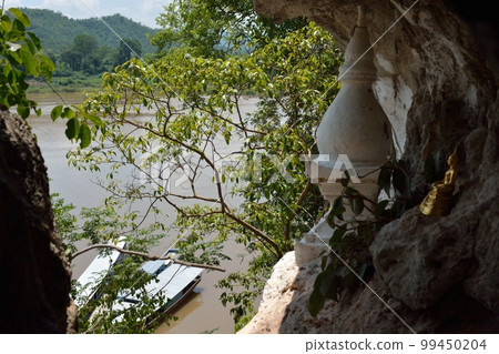 Buddhist ruins Pak Ou caves on the upper Mekong River 99450204