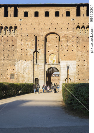 Secondary entrance Sforza Castle in Milan at sunny day Secondary entrance Sforza Castle in Milan at sunny day 99450304