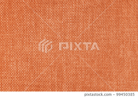 Jacquard woven upholstery, orange coarse fabric texture close up 99450385
