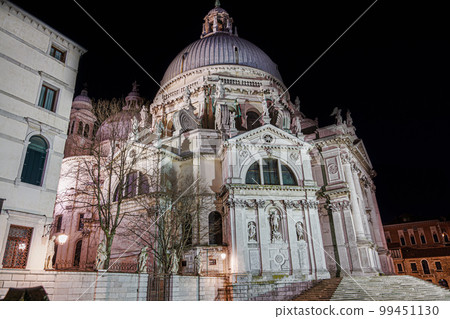 Venice Italy night view of Saint Mary of Health, Basilica di Santa Maria della Salute with cupola at Dorsoduro area. 99451130