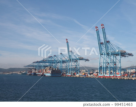 Blue cranes in port of european Algeciras city in Cadiz in Spain Blue cranes in port of european Algeciras city in Cadiz in Spain 99451463